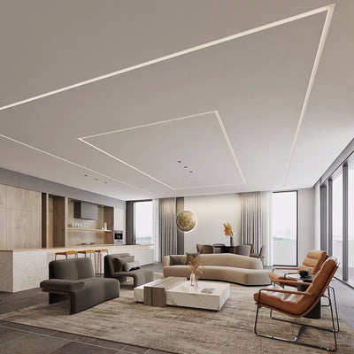 Plaster-In Wall Wash Profile — trimless light lines across a living room ceiling