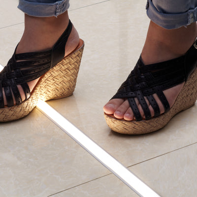 Waterproof Recessed Profile installed as a light line in a tiled floor