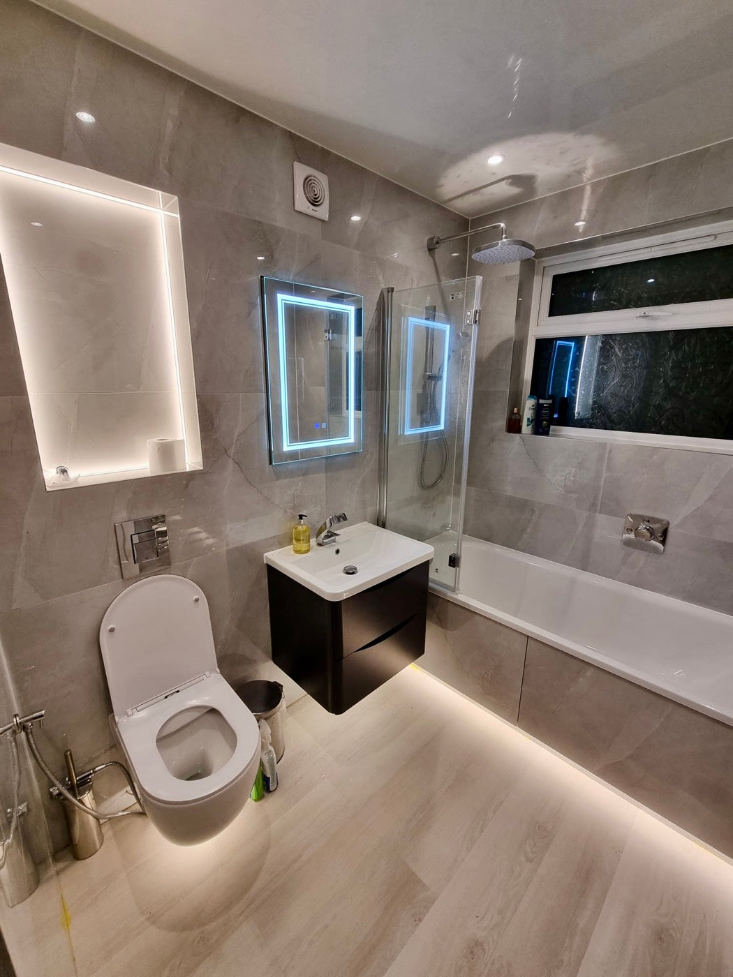 Backlit mirror & floating vanity